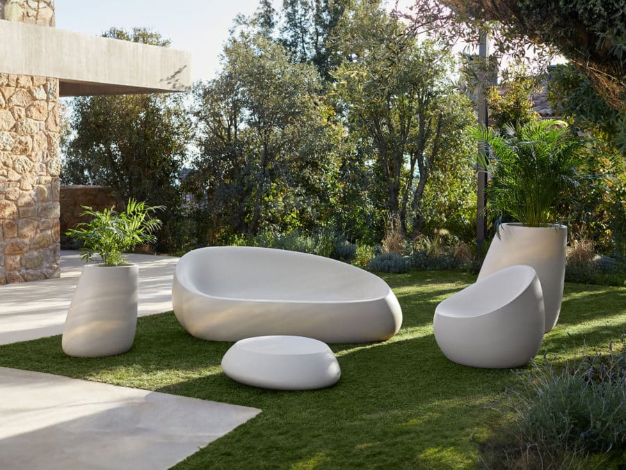 Vondom - STONE collection showing sofa, lounge chair, coffee table, and various planters