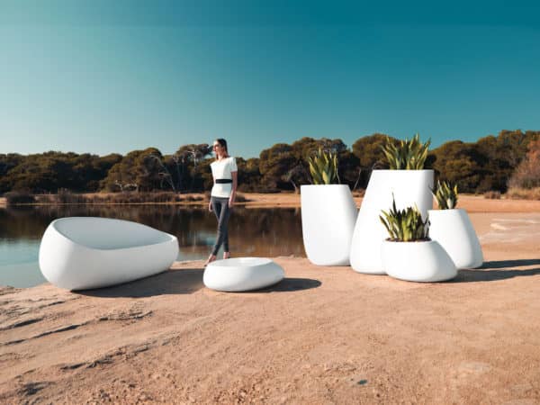 Vondom - STONE collection showing sofa, coffee table, and various size planters